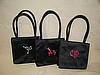 Unique monograms on silk handbags